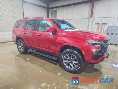 Czwarte zdjęcie samochodu z boku: 2024 CHEVROLET TAHOE K1500 Z71 VIN:1GNSKPKD8RR395590 - miniatura