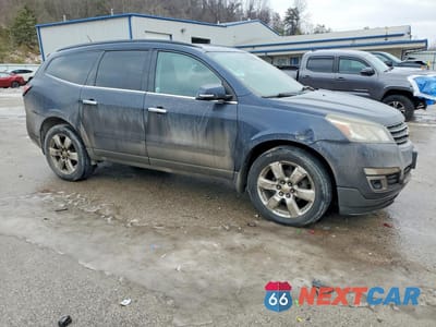 Czwarte zdjęcie samochodu z boku: 2016 CHEVROLET TRAVERSE LT VIN:1GNKVGKD3GJ245793 - miniatura