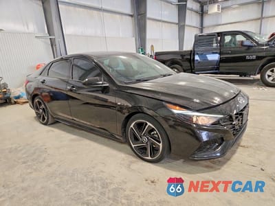 Czwarte zdjęcie samochodu z boku: 2023 HYUNDAI ELANTRA N LINE VIN:KMHLR4AF5PU370825 - miniatura