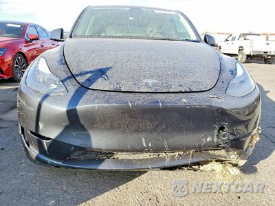 Piąte zdjęcie samochodu w środku: 2025 TESLA MODEL Y VIN:7SAYGAEE8SF236184 - miniatura