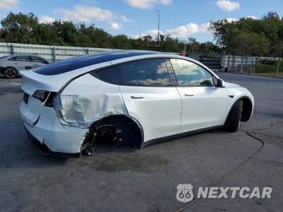 Trzecie zdjęcie samochodu z tyłu: 2023 TESLA MODEL Y VIN:7SAYGDEE5PF771191 - miniatura
