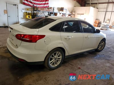 Trzecie zdjęcie samochodu z tyłu: 2015 FORD FOCUS SE VIN:1FADP3F22FL323244 - miniatura