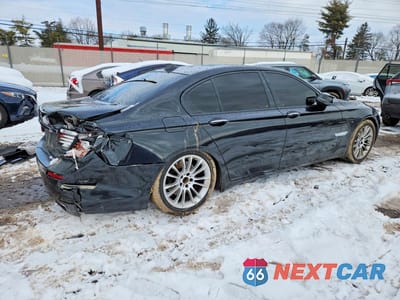 Trzecie zdjęcie samochodu z tyłu: 2013 BMW 740 I VIN:WBAYA6C5XDC994927 - miniatura