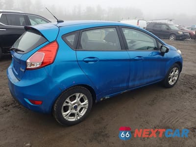 Trzecie zdjęcie samochodu z tyłu: 2015 FORD FIESTA SE VIN:3FADP4EJ3FM208374 - miniatura