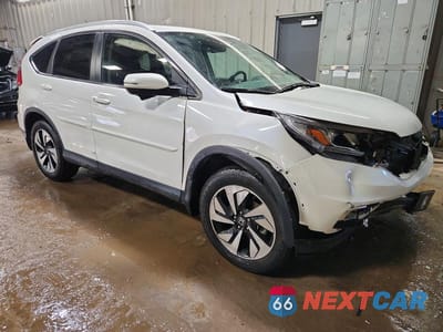 Czwarte zdjęcie samochodu z boku: 2016 HONDA CR-V TOURING VIN:5J6RM4H90GL094552 - miniatura