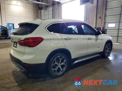 Trzecie zdjęcie samochodu z tyłu: 2018 BMW X1 XDRIVE28I VIN:WBXHT3C35J5K23370 - miniatura