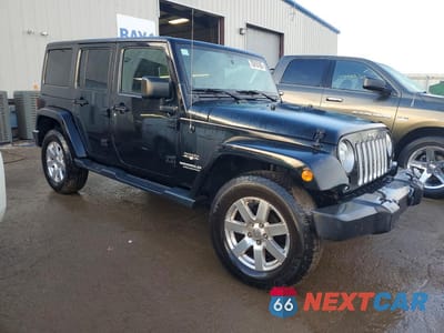 Czwarte zdjęcie samochodu z boku: 2017 JEEP WRANGLER UNLIMITED SAHARA VIN:1C4BJWEG5HL723013 - miniatura