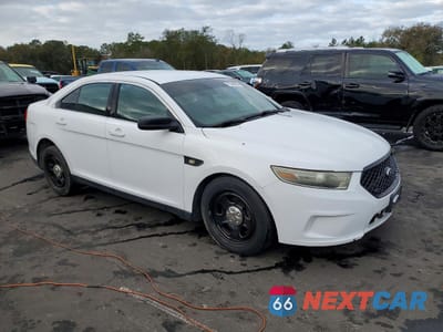 Czwarte zdjęcie samochodu z boku: 2014 FORD TAURUS POLICE INTERCEPTOR VIN:1FAHP2MK6EG122078 - miniatura