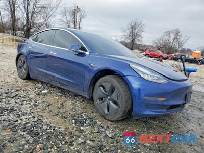 Czwarte zdjęcie samochodu z boku: 2019 TESLA MODEL 3 VIN:5YJ3E1EA1KF299492 - miniatura