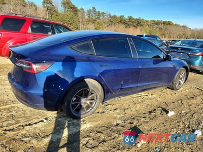 Trzecie zdjęcie samochodu z tyłu: 2023 TESLA MODEL 3 VIN:5YJ3E1EA2PF555548 - miniatura