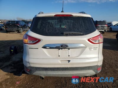 Zdjęcie 6 z 12 samochodu: 2014 FORD ESCAPE TITANIUM VIN:1FMCU0JX4EUD43208 - miniatura