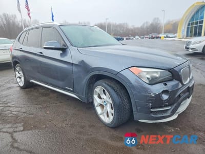 Czwarte zdjęcie samochodu z boku: 2015 BMW X1 XDRIVE28I VIN:WBAVL1C51FVY34684 - miniatura