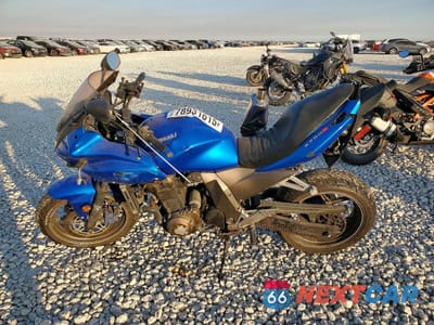 Trzecie zdjęcie samochodu z tyłu: 2005 KAWASAKI ZR750 K1 VIN:JKAZRDK175A000244 - miniatura