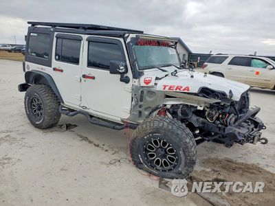 Czwarte zdjęcie samochodu z boku: 2013 JEEP WRANGLER UNLIMITED SPORT VIN:1C4HJWDG7DL668490 - miniatura