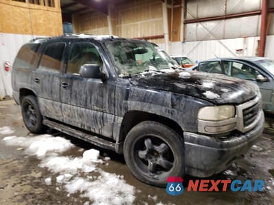 Czwarte zdjęcie samochodu z boku: 2004 GMC YUKON DENALI VIN:1GKEK63U24J266156 - miniatura