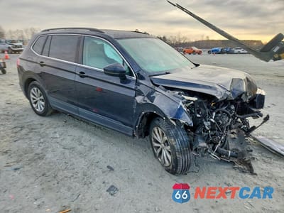 Czwarte zdjęcie samochodu z boku: 2019 VOLKSWAGEN TIGUAN SE VIN:3VV2B7AX3KM043871 - miniatura