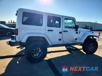 Trzecie zdjęcie samochodu z tyłu: 2012 JEEP WRANGLER UNLIMITED SAHARA VIN:1C4BJWEG6CL186516 - miniatura
