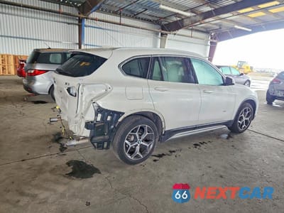 Trzecie zdjęcie samochodu z tyłu: 2018 BMW X1 XDRIVE28I VIN:WBXHT3C36J5K24740 - miniatura