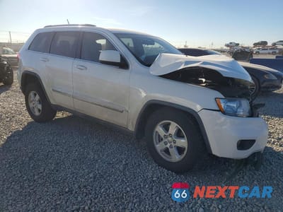 Czwarte zdjęcie samochodu z boku: 2012 JEEP GRAND CHEROKEE LAREDO VIN:1C4RJEAGXCC137513 - miniatura