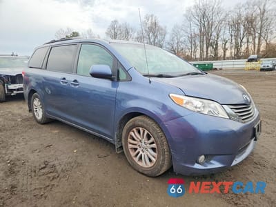 Czwarte zdjęcie samochodu z boku: 2014 TOYOTA SIENNA XLE 8-PASSENGER VIN:5TDYK3DCXES444333 - miniatura