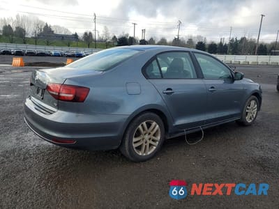 Trzecie zdjęcie samochodu z tyłu: 2018 VOLKSWAGEN JETTA S VIN:3VW2B7AJ2JM260558 - miniatura