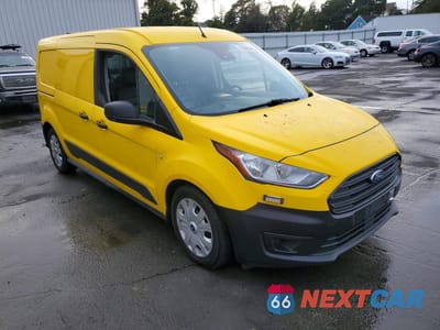 Czwarte zdjęcie samochodu z boku: 2019 FORD TRANSIT CONNECT XL VIN:NM0LS7E2XK1430588 - miniatura
