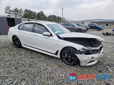 Czwarte zdjęcie samochodu z boku: 2018 BMW 750 XI VIN:WBA7B0C53JG527293 - miniatura