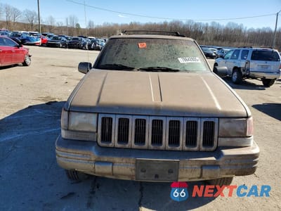 Piąte zdjęcie samochodu w środku: 1998 JEEP GRAND CHEROKEE LIMITED VIN:1J4GZ78YXWC355279 - miniatura