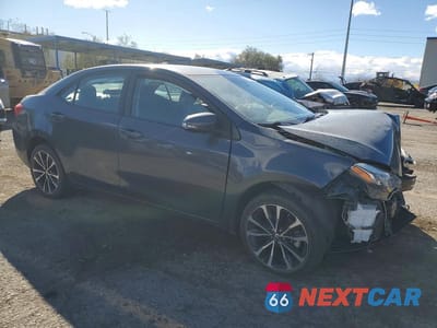 Czwarte zdjęcie samochodu z boku: 2018 TOYOTA COROLLA L VIN:5YFBURHE7JP792561 - miniatura