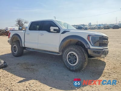 Czwarte zdjęcie samochodu z boku: 2022 FORD F150 VIN:1FTFW1RG2NFB44409 - miniatura