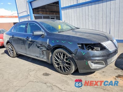 Czwarte zdjęcie samochodu z boku: 2011 LINCOLN MKS VIN:1LNHL9FT2BG607412 - miniatura