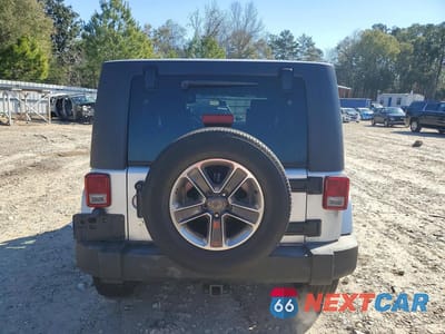 Zdjęcie 6 z 12 samochodu: 2007 JEEP WRANGLER VIN:1J4GB59157L205771 - miniatura