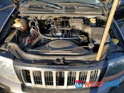 Zdjęcie 11 z 12 samochodu: 2004 JEEP GRAND CHEROKEE LAREDO VIN:1J4GW48S24C279153 - miniatura