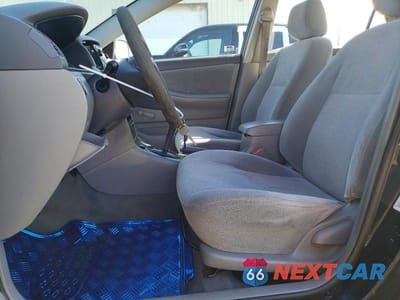 Zdjęcie 7 z 11 samochodu: 2003 TOYOTA COROLLA CE VIN:JTDBR32E330028694 - miniatura