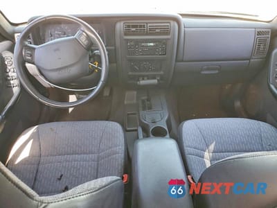 Zdjęcie 8 z 12 samochodu: 2001 JEEP CHEROKEE SPORT VIN:1J4FT48S41L588073 - miniatura