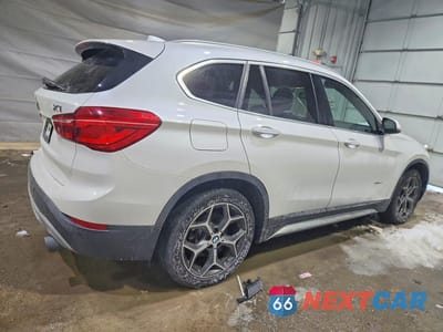 Trzecie zdjęcie samochodu z tyłu: 2016 BMW X1 XDRIVE28I VIN:WBXHT3C31G5E48753 - miniatura