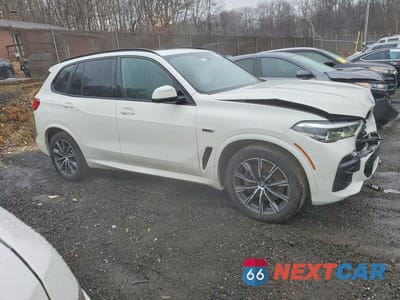 Czwarte zdjęcie samochodu z boku: 2023 BMW X5 XDRIVE45E VIN:5UXTA6C04P9S00585 - miniatura