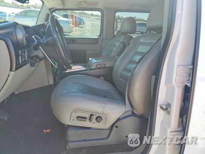 Zdjęcie 7 z 11 samochodu: 2003 HUMMER H2 VIN:5GRGN23U53H127504 - miniatura