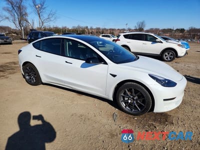 Czwarte zdjęcie samochodu z boku: 2023 TESLA MODEL 3 VIN:5YJ3E1EAXPF486382 - miniatura
