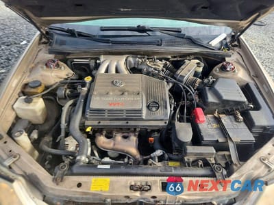 Zdjęcie 11 z 12 samochodu: 2002 TOYOTA AVALON XL VIN:4T1BF28B82U265801 - miniatura