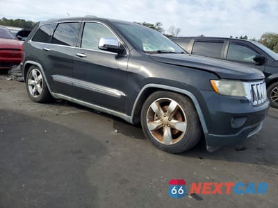 Czwarte zdjęcie samochodu z boku: 2011 JEEP GRAND CHEROKEE OVERLAND VIN:1J4RR6GTXBC607938 - miniatura