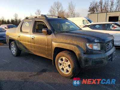 Czwarte zdjęcie samochodu z boku: 2006 HONDA RIDGELINE RTL VIN:2HJYK16516H549213 - miniatura