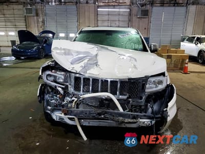 Piąte zdjęcie samochodu w środku: 2011 JEEP GRAND CHEROKEE OVERLAND VIN:1J4RR6GT7BC535970 - miniatura
