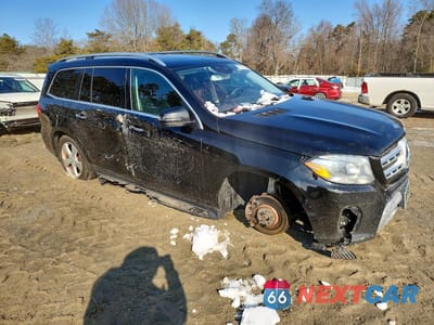 Czwarte zdjęcie samochodu z boku: 2017 MERCEDES-BENZ GLS 450 4MATIC VIN:4JGDF6EEXHA759019 - miniatura