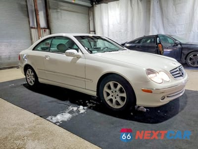 Czwarte zdjęcie samochodu z boku: 2004 MERCEDES-BENZ CLK 320C VIN:WDBTJ65J64F106288 - miniatura