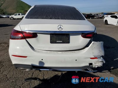 Zdjęcie 6 z 13 samochodu: 2022 MERCEDES-BENZ E 350 VIN:W1KZF8DB9NB021883 - miniatura