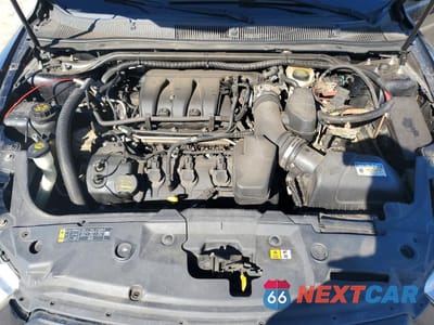 Zdjęcie 11 z 14 samochodu: 2014 FORD TAURUS POLICE INTERCEPTOR VIN:1FAHP2MK3EG120210 - miniatura