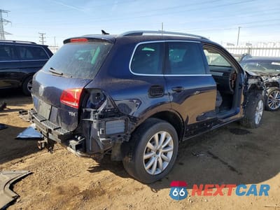 Trzecie zdjęcie samochodu z tyłu: 2011 VOLKSWAGEN TOUAREG V6 TDI VIN:WVGFK9BP8BD002170 - miniatura