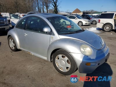 Czwarte zdjęcie samochodu z boku: 1999 VOLKSWAGEN NEW BEETLE GLS VIN:3VWCC21C6XM454931 - miniatura