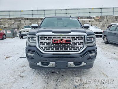 Piąte zdjęcie samochodu w środku: 2017 GMC SIERRA K1500 DENALI VIN:3GTU2PEC7HG143672 - miniatura